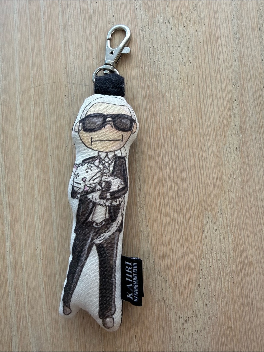 KAHRI Karl doll bag charm keychain — Black & Cream